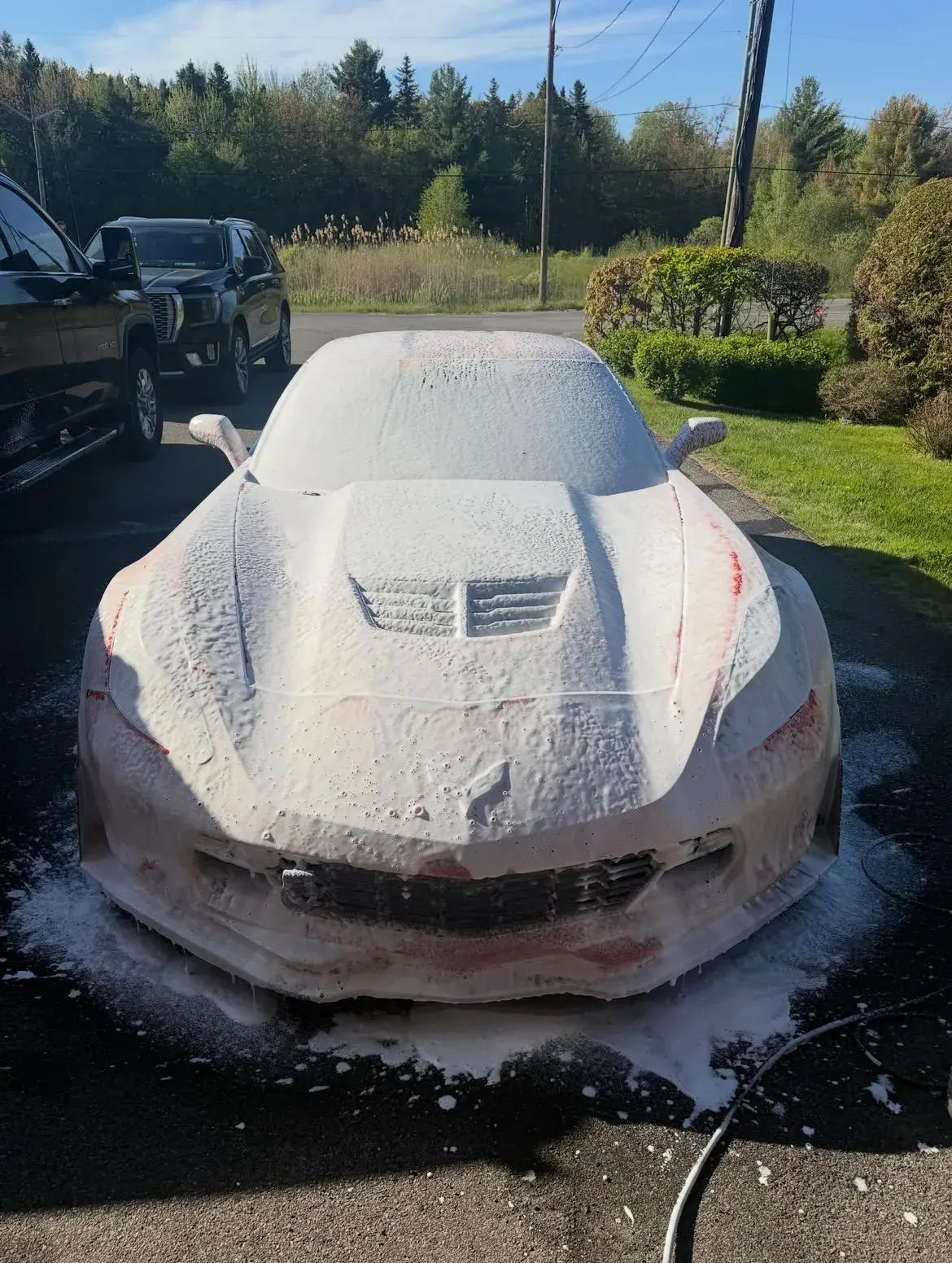 Foam wash stage on a sports car